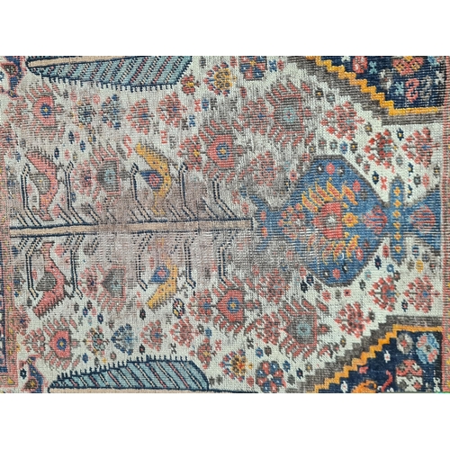 936 - A multi-bordered Shirvan Rug with central field of trees and birds, spandrels with mustard tigers, 1... 