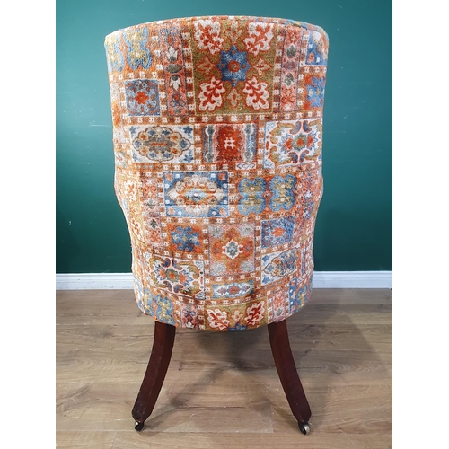 643 - A 19th Century button back Armchair with chiefly red upholstery with all over geometric style design... 