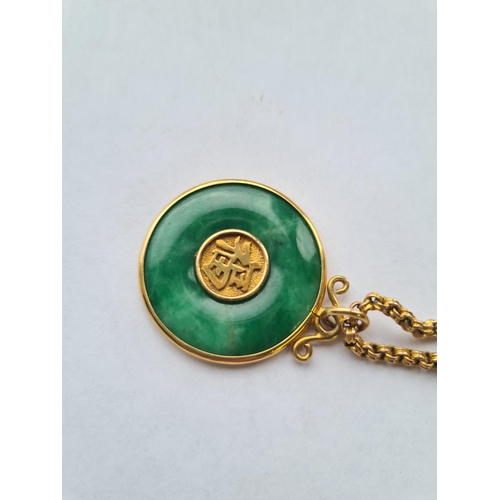 239 - A Chinese Jade Disc Pendant with characters to centre on chain marked 10c, approx 10.70gms