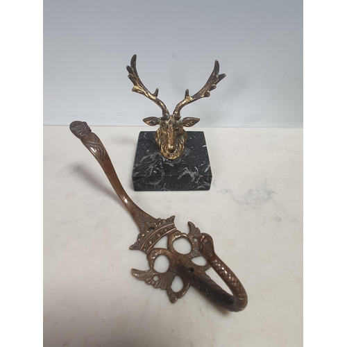 42 - A gilt bronze Stags Head mounted on a square marble plinth base, 3.5