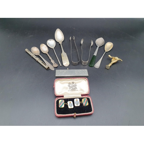 120 - Two pairs of silver Sugar Tongs, green hardstone handled Spoon, various Spoons, Comb, brass Pipe Tam... 