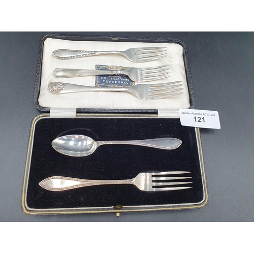 121 - An Edward VII silver Christening Fork and Spoon, Chester 1907, in case, and three various silver For... 