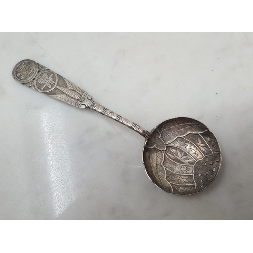 143 - A Chinese silver Spoon with engraved decoration and six other Spoons in silver and plate