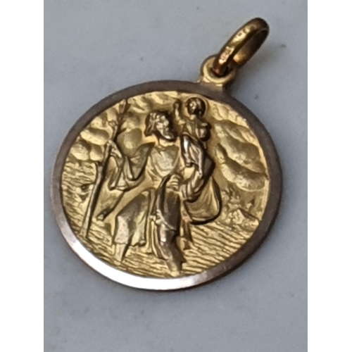 148 - A St Christopher Medallion, marked 9ct, 3.5gms, and a pair of gilt metal and mother of pearl Cuff Li... 