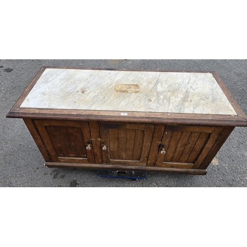 15 - A Victorian marble topped Cupboard with mahogany top and pine base fitted three doors on plinth base... 