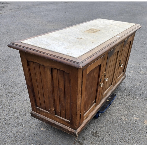 15 - A Victorian marble topped Cupboard with mahogany top and pine base fitted three doors on plinth base... 