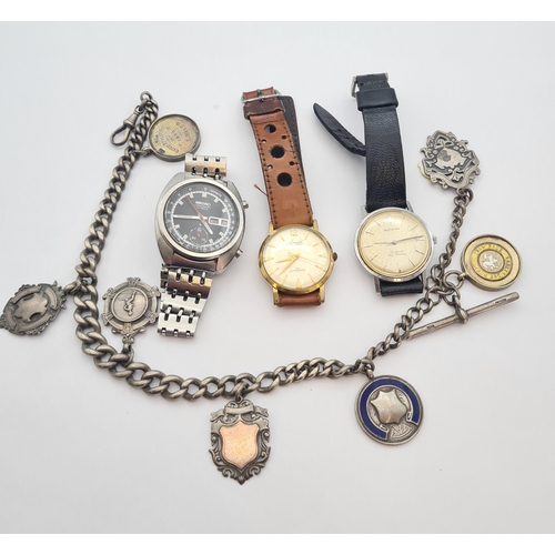 153 - A heavy silver Watch Albert suspending several fobs, a gentleman's Seiko Chronograph Wristwatch, a g... 