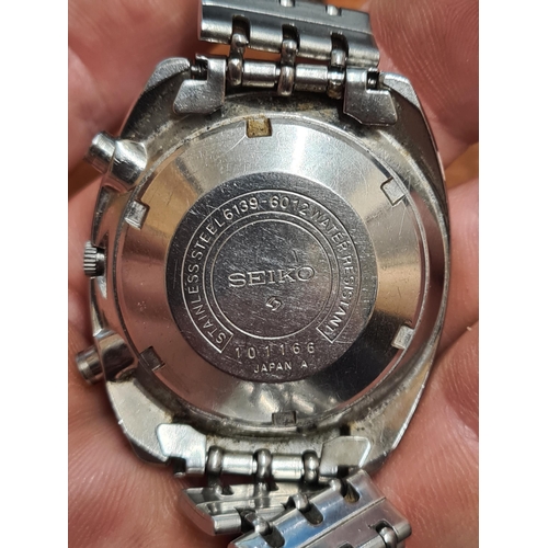 153 - A heavy silver Watch Albert suspending several fobs, a gentleman's Seiko Chronograph Wristwatch, a g... 