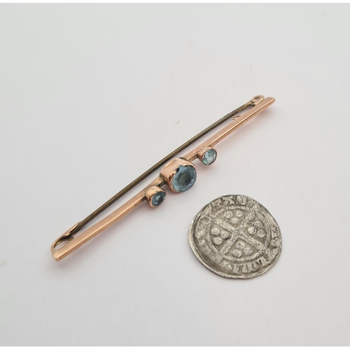 161 - An Aquamarine Bar Brooch set three round stones in 9ct gold and an Edward II silver Penny