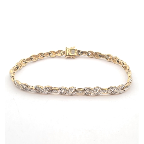 164 - A two coloured 9ct gold Bracelet set diamond chips, approx 18cms long, approx 9.50gms