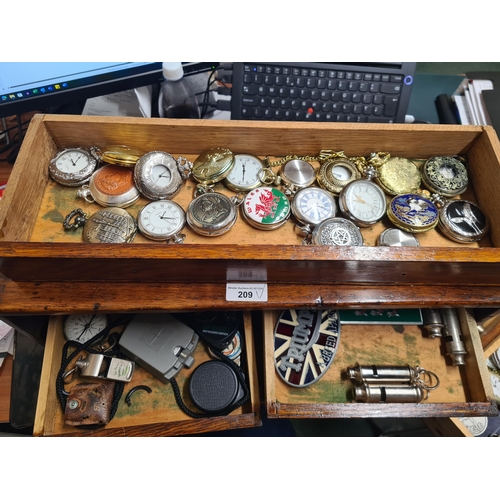 209 - A 'Nelson' Set of Drawers enclosed by door containing a quantity of Watches, Whistles and Parts, etc... 