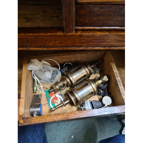 209 - A 'Nelson' Set of Drawers enclosed by door containing a quantity of Watches, Whistles and Parts, etc... 