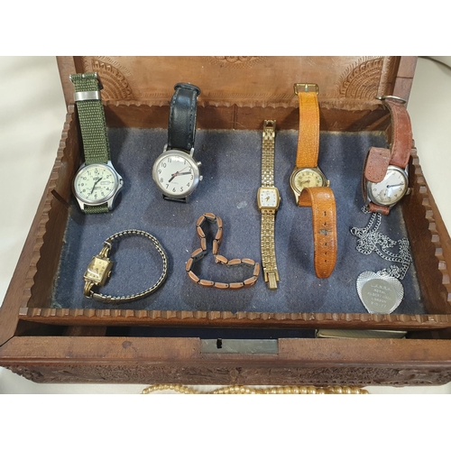 220 - A carved wooden Box containing various Costume jewellery, Wristwatches