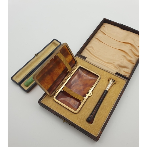 232 - An Art Deco faux tortoiseshell Cheroot Holder and Case (boxed) and another Art Deco Cheroot Holder (... 