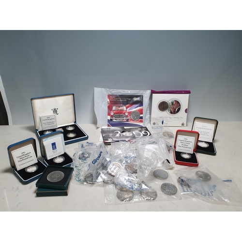 243 - A collection of mainly modern Commemorative Coins to include a silver proof Piedfort One Pound Coin ... 