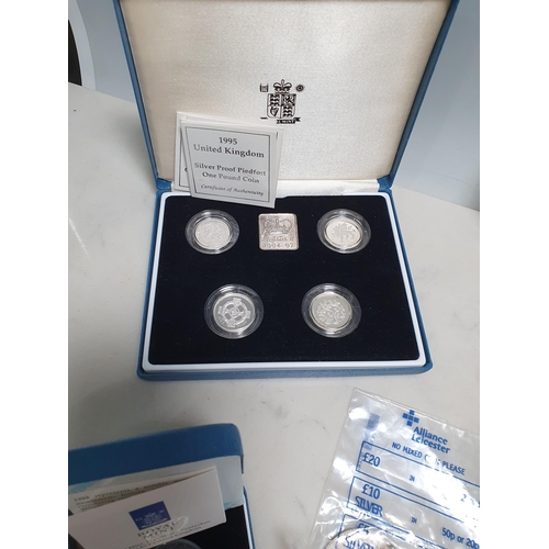 243 - A collection of mainly modern Commemorative Coins to include a silver proof Piedfort One Pound Coin ... 