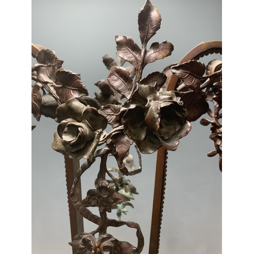 256 - A large bronzed metal Epergne Stand, decorated with foliate swags