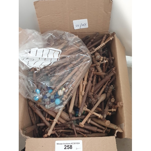 258 - A box of approximately 500 wooden Lace Bobbins and two Victorian Shawls, (R4)