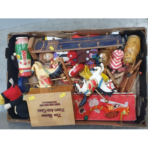 260 - Two boxes containing Costume Jewellery, colourful Bangles, a boxed First Aid Kit, Puppets, fairgroun... 