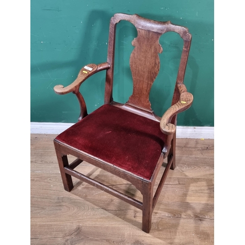 263 - A Georgian oak Carver Chair with splat back, shaped and scrolled arms on squared supports and stretc... 