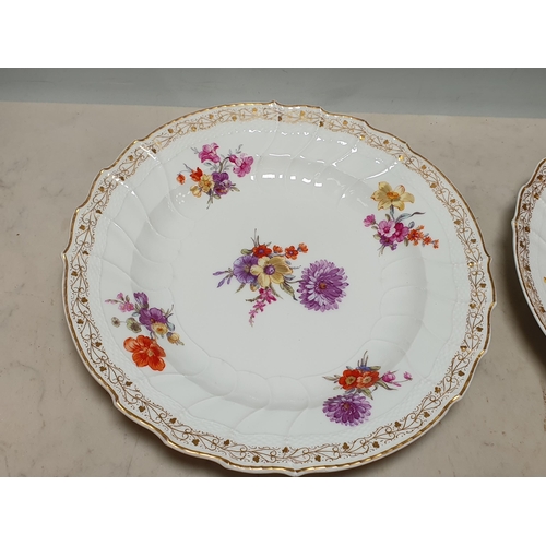 270 - A pair of KPM Germany Plates, painted sprays of flowers with gilded border, 9 1/2 in diam, (R4)