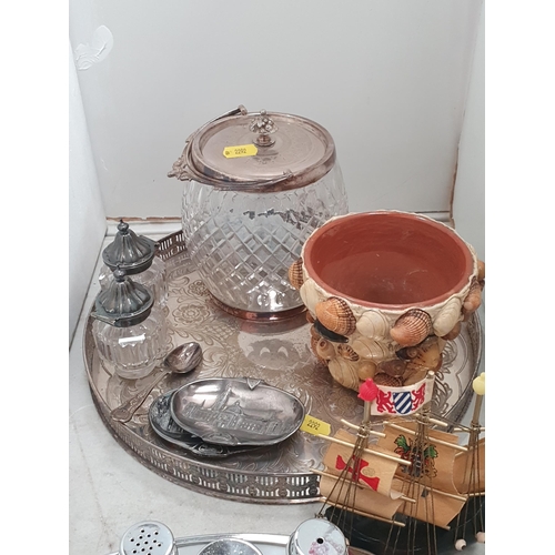 290 - A selection of plated items including a Tray, a Biscuit Barrel with glass base, Cruets, a Cake Knife... 