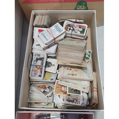 305 - A quantity of Cigarette Cards, a child's Singer Sewing Machine in original box, a selection of vario... 