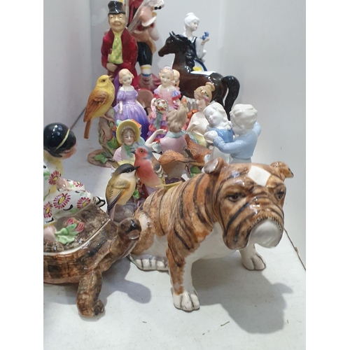 306 - A selection of figures including a Beswick Pony, Royal Doulton figures of Marie, Rose and The Little... 