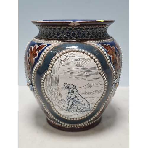 308 - A Doulton Lambeth Hannah Barlow Vase with panels depicting various breeds of dogs, inscribed HB to b... 