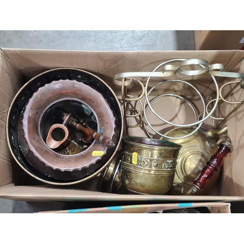 320 - Two boxes of copper and brassware including Jardinieres, Horse Brasses, a Kettle, and also two Soda ... 