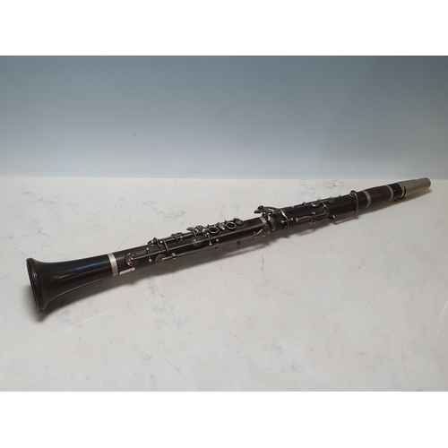 331 - A cocus wood Clarinet with plated key work, (R4)