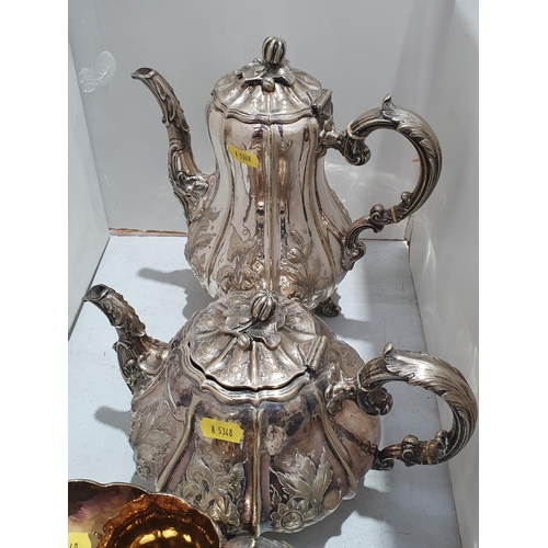 339 - A silver plated four-piece Tea and Coffee Service with floral embossing, (R4)