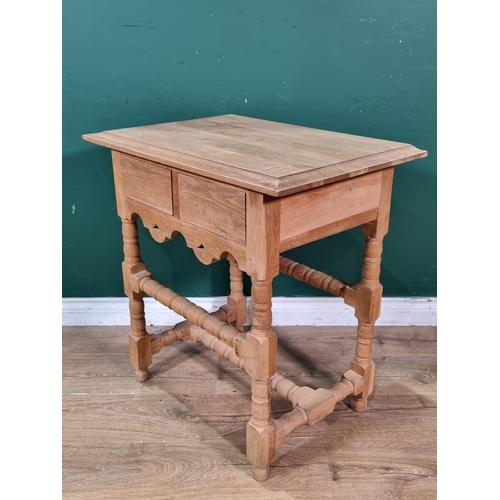 432 - A pale oak Side Table, fitted two frieze drawers, on bobbin turned squared supports and stretchers, ... 