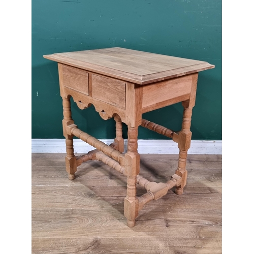 432 - A pale oak Side Table, fitted two frieze drawers, on bobbin turned squared supports and stretchers, ... 