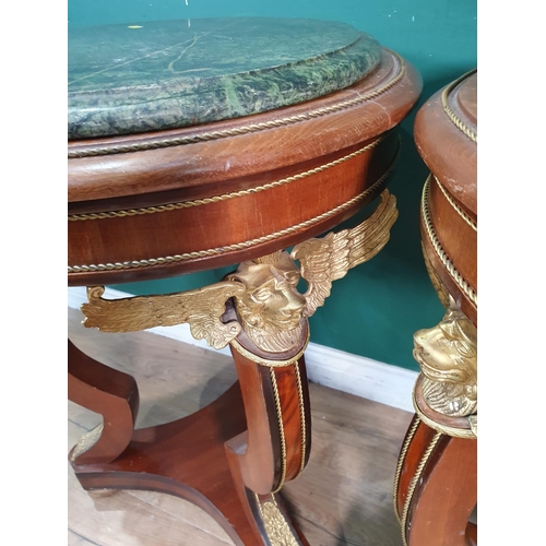 44 - A pair of Empire style mahogany Occasional Tables with marble tops and gilded winged angel decoratio... 