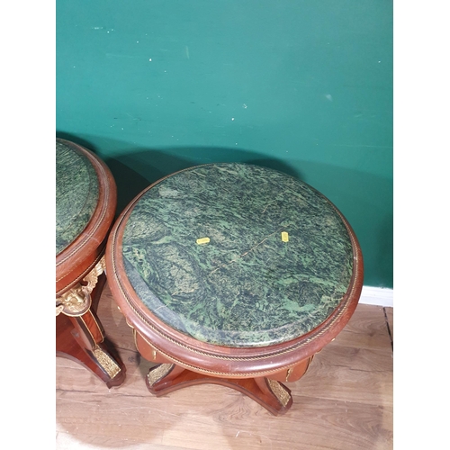 44 - A pair of Empire style mahogany Occasional Tables with marble tops and gilded winged angel decoratio... 