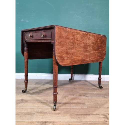 449 - A 19th Century mahogany Pembroke Table on turned supports and casters, (R3)