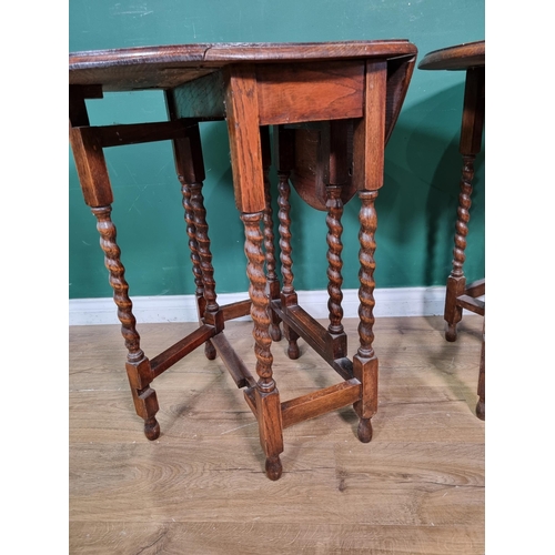 487 - Two oak gateleg Tables on barley twist supports 2ft 6in H x 2ft W (R5)