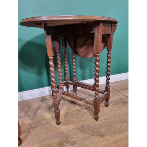 487 - Two oak gateleg Tables on barley twist supports 2ft 6in H x 2ft W (R5)