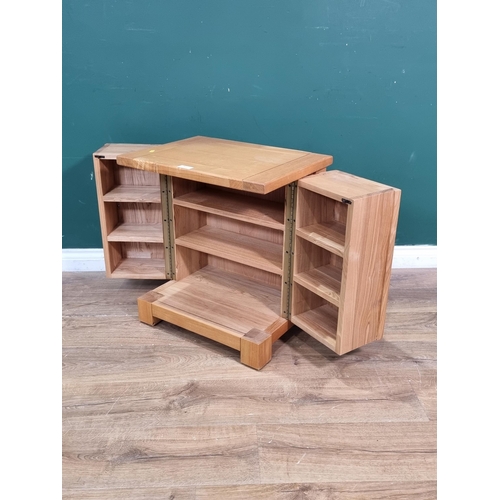 512 - An oak CD Cupboard 2ft H x 1ft 9in W (R6)