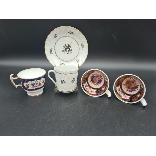 52 - A Chamberlain, Worcester Cup and Saucer spirally moulded and painted floral sprigs in gilt and black... 