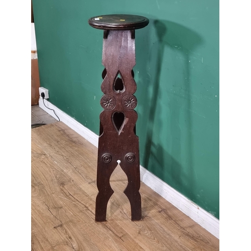 522 - A carved oak Plant Stand with pierced and shaped side supports 3ft 8in H x 11in D (R6)