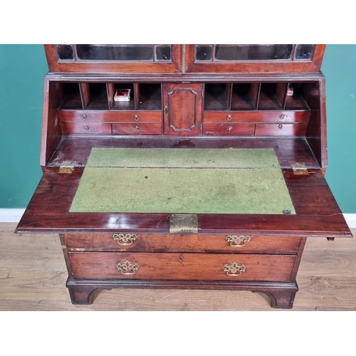 529 - A 19th Century mahogany Bureau Bookcase fitted pair of astragal glazed doors above base fitted two s... 