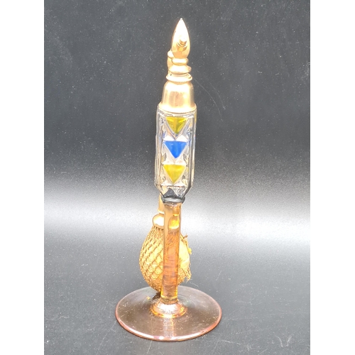 53 - An amber and coloured glass Perfume Atomiser with gilt metal mounts, a Peter Tysoe glass Scent Bottl... 