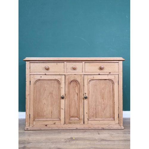 540 - A Victorian pine Sideboard fitted three frieze drawers above pair of arched panel doors 4ft 3in W x3... 