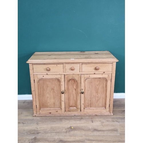 540 - A Victorian pine Sideboard fitted three frieze drawers above pair of arched panel doors 4ft 3in W x3... 