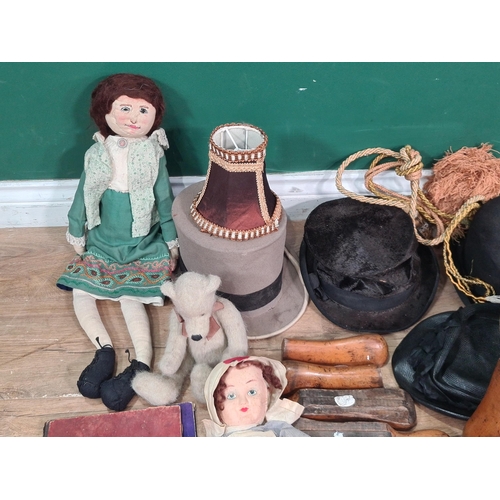 572 - A box of Dolls, wooden Shoe Trees, Hats, etc. (R5)