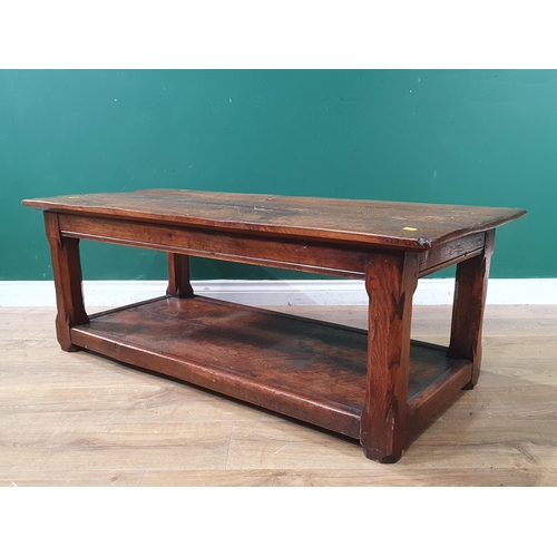 617 - An oak Coffee Table on chamfered supports 4ft W x 1ft 6in H and a Stool with cane top (R7)