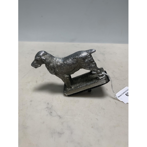 62 - A chrome Car Mascot in the form of a Spaniel, the base stamped 'Made in England', 4in H including th... 