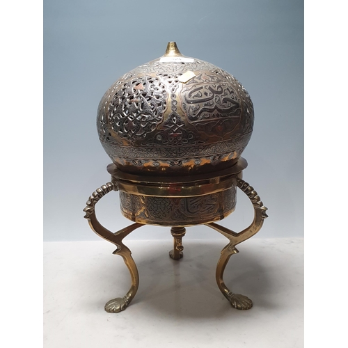 625 - An Eastern brass Incense Burner on base with three scroll supports 1ft 3in H x 9in D (R4)